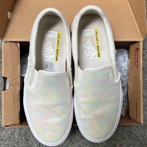 Gently used white iridescent slip on Vans